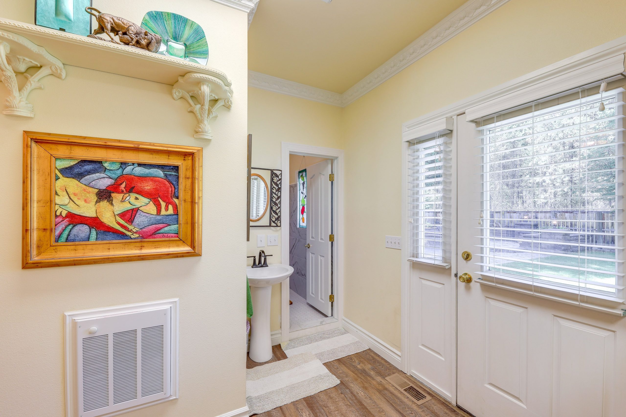 shows door into upstairs bathroom